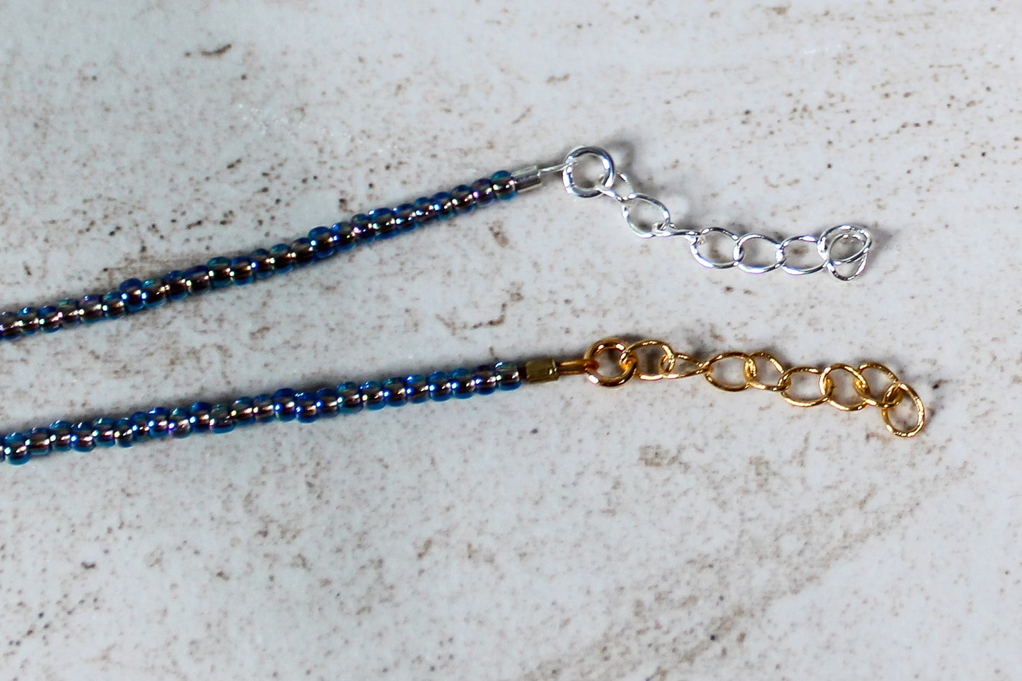 Close-up of the September bracelet’s extender chain showing adjustable links in gold or silver to suit any wrist.