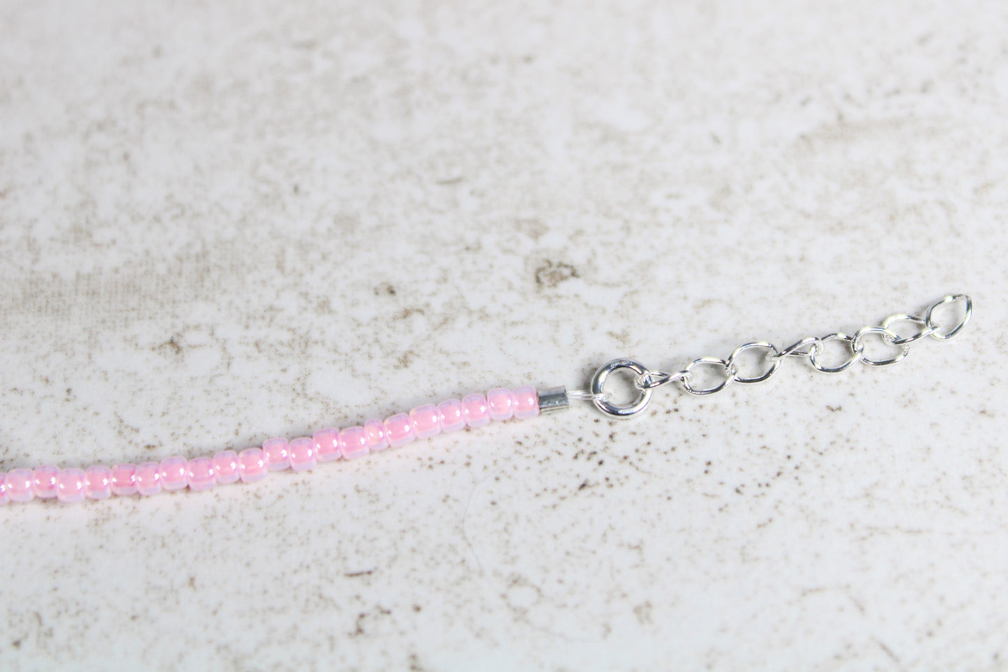 Close-up of the silver extender chain showing adjustable sizing on the Short n Sweet bracelet