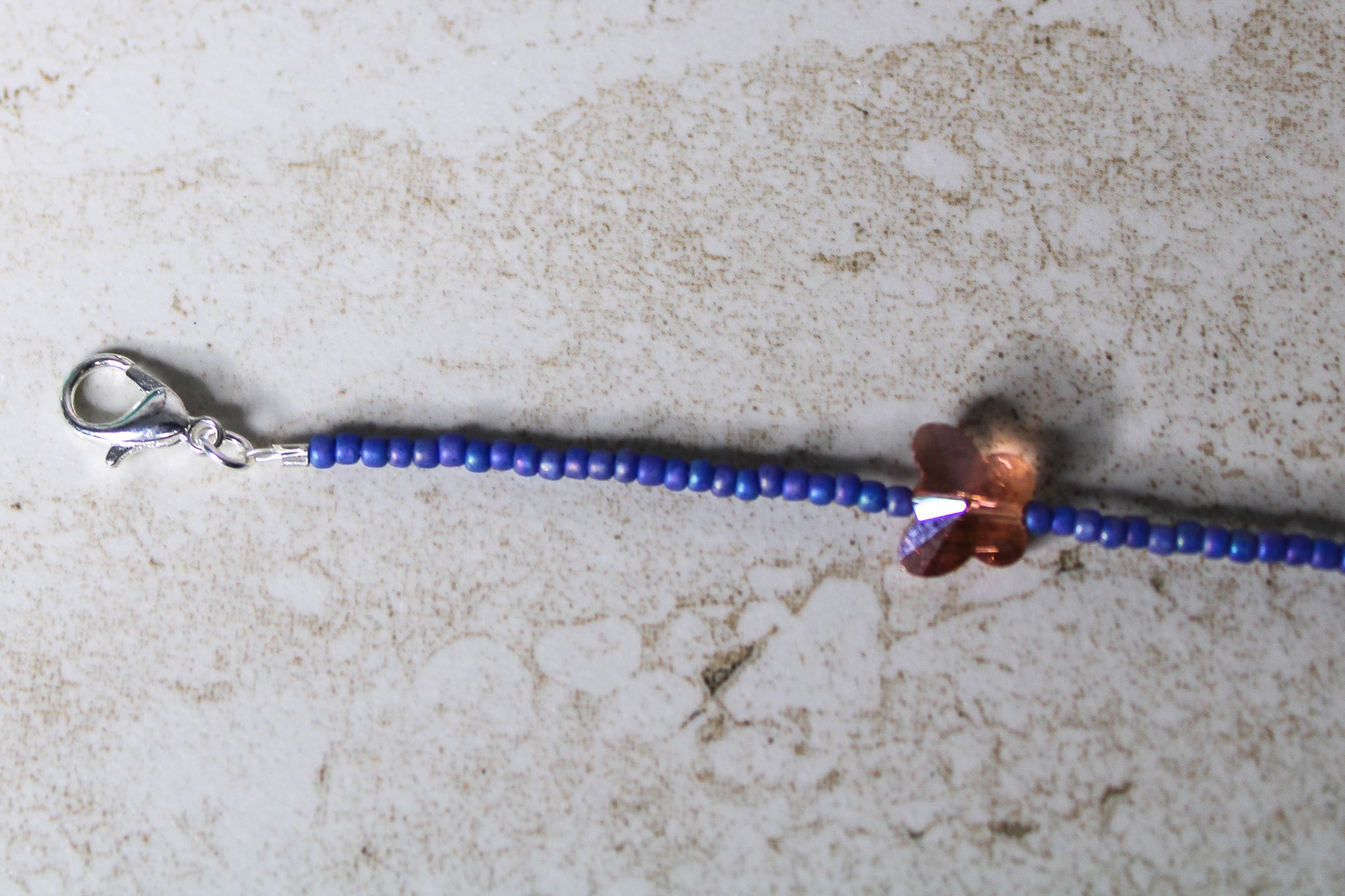 Close-up shot of the lobster clasp, highlighting its durability and secure closure.