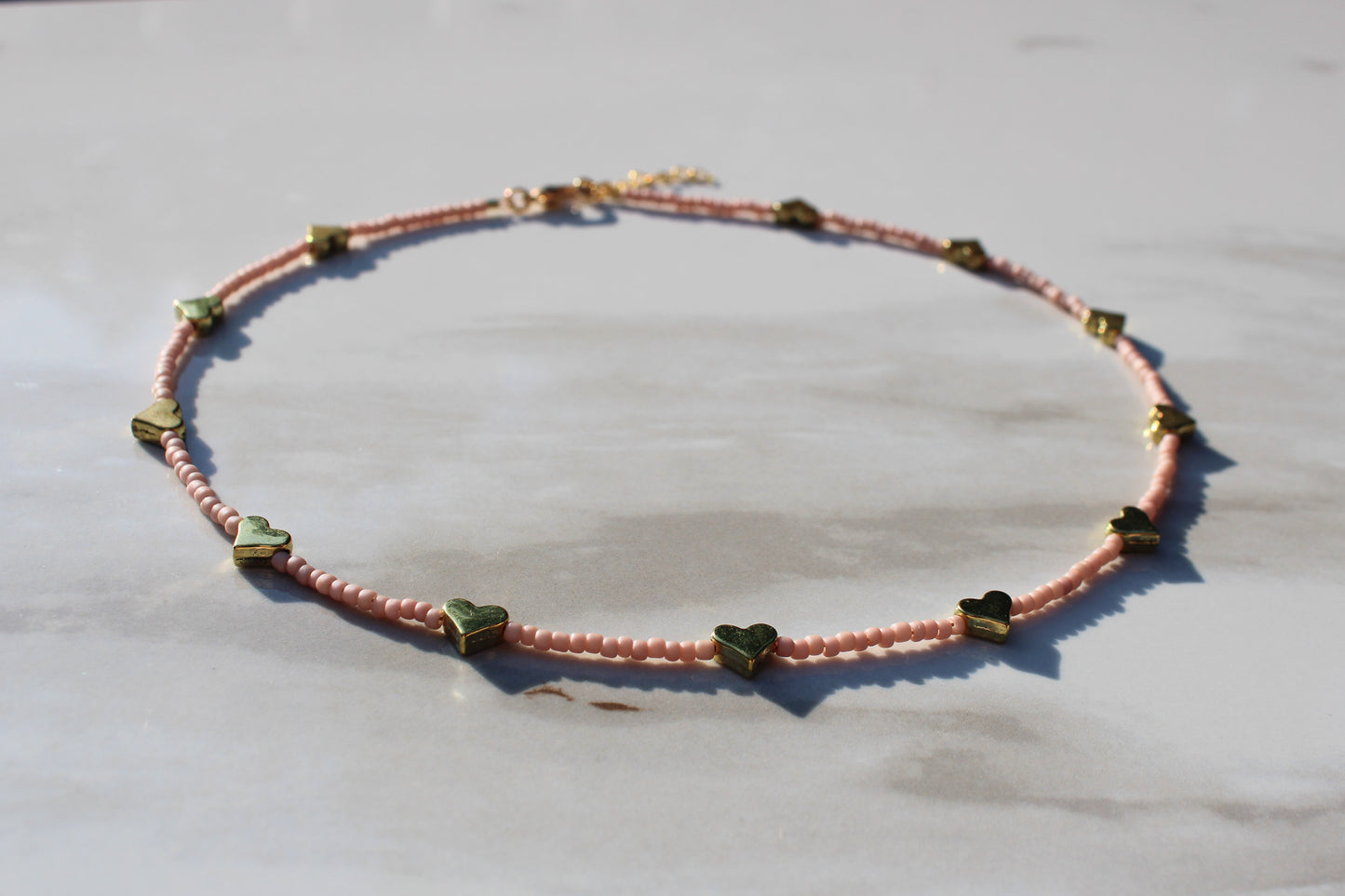 Pale Pink Seed Bead Choker Necklace with Antique Gold Heart Beads