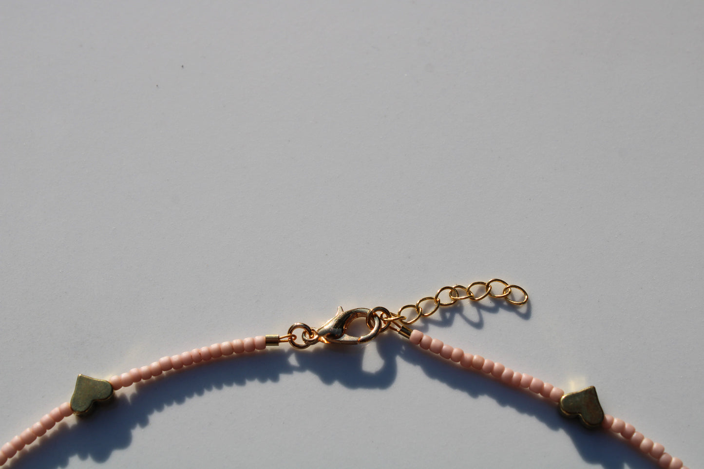 Pale Pink Seed Bead Choker Necklace with Antique Gold Heart Beads