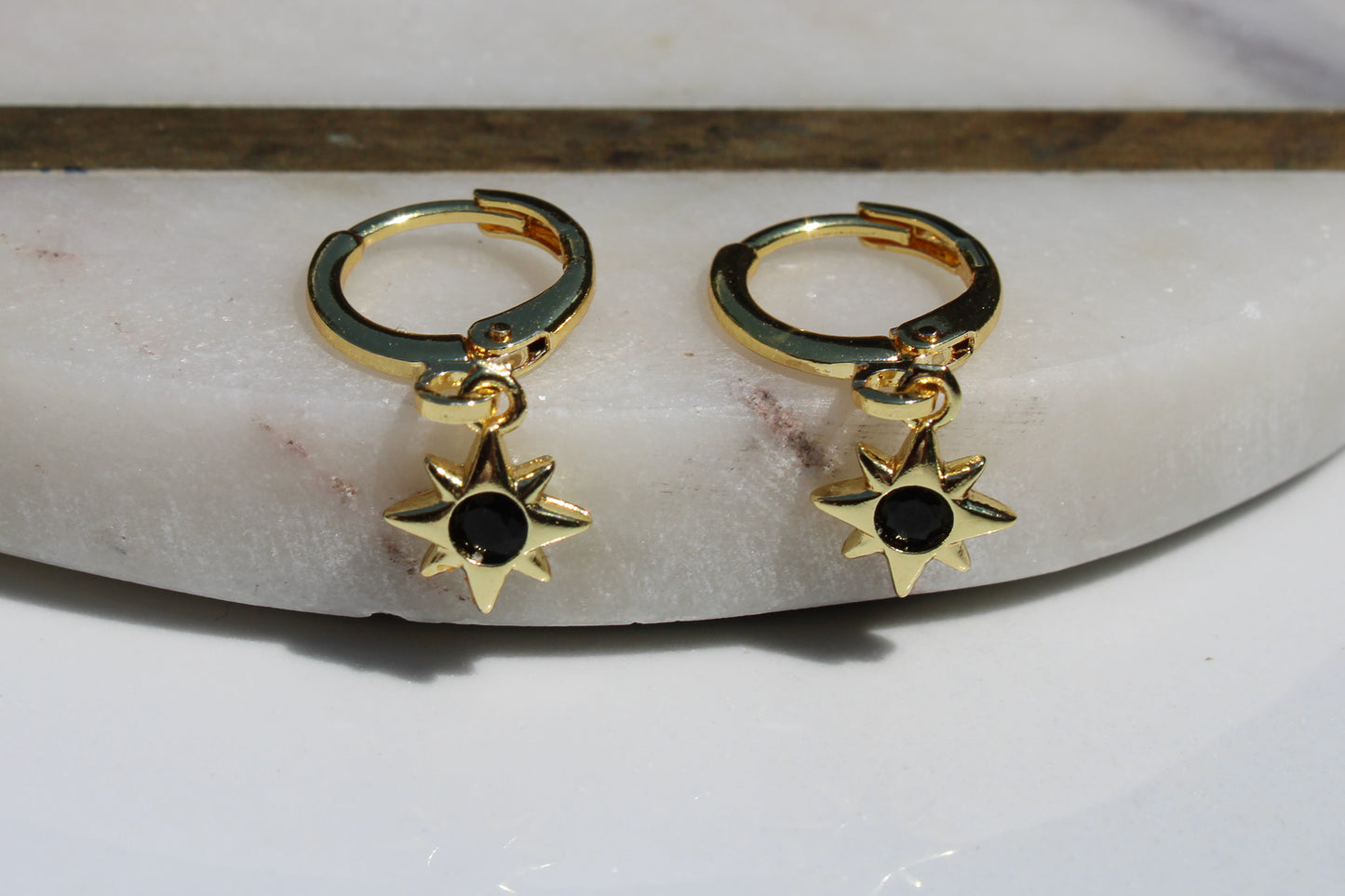 North Star Charm Huggie Hoop Earrings in Black and Gold