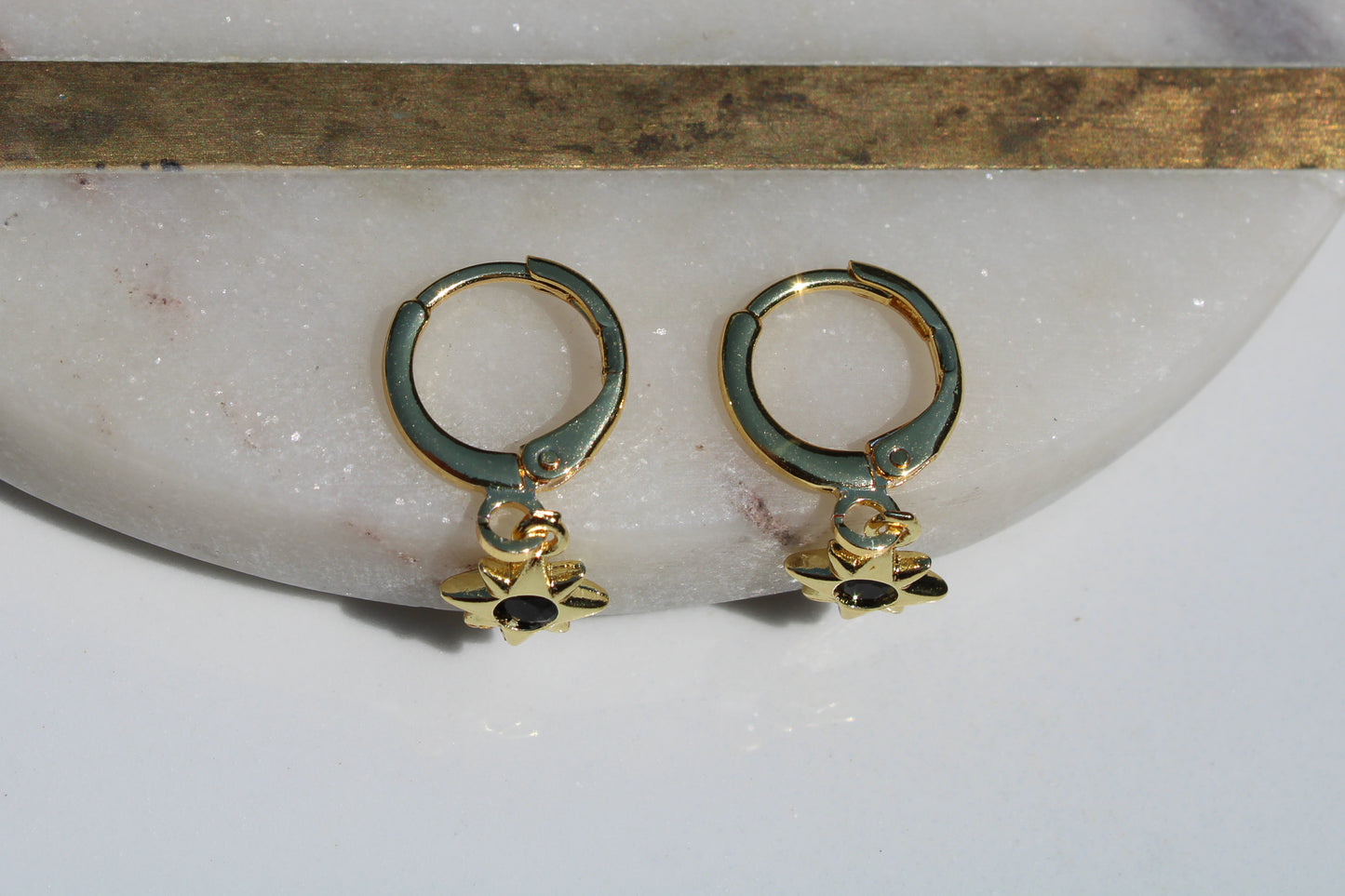 North Star Charm Huggie Hoop Earrings in Black and Gold