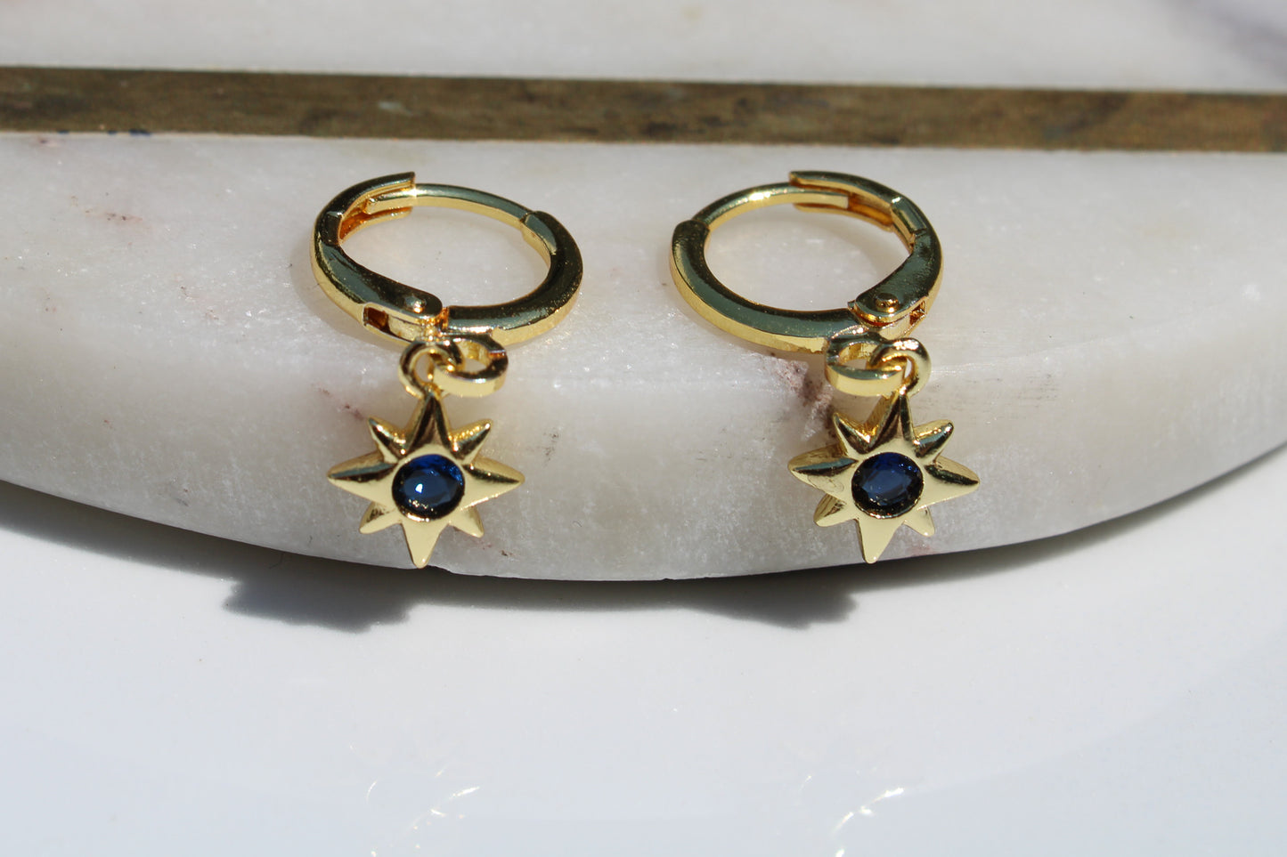 North Star Charm Huggie Hoop Earrings in Sapphire Blue and Gold