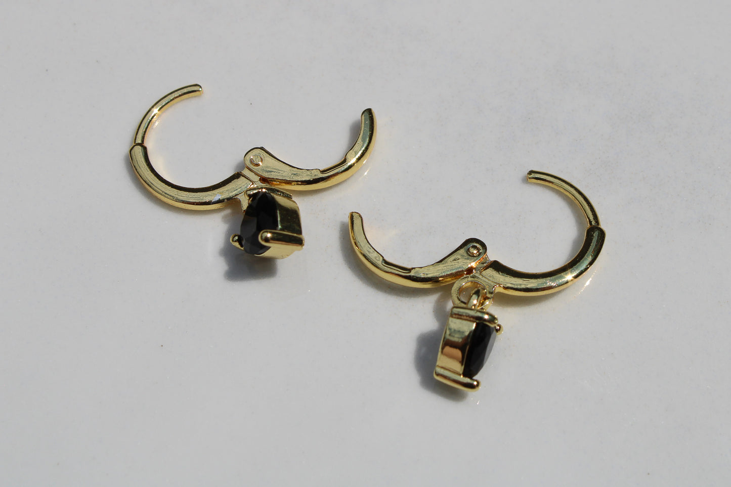 Heart Charm Huggie Hoop Earrings in Black and Gold